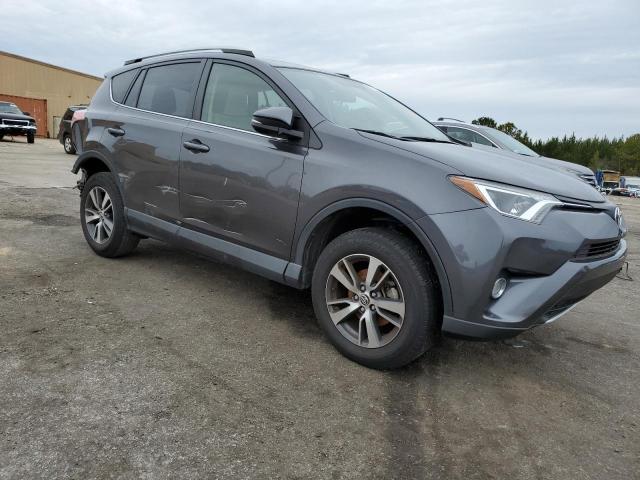 JTMWFREV3GJ066127 - 2016 TOYOTA RAV4 XLE CHARCOAL photo 4