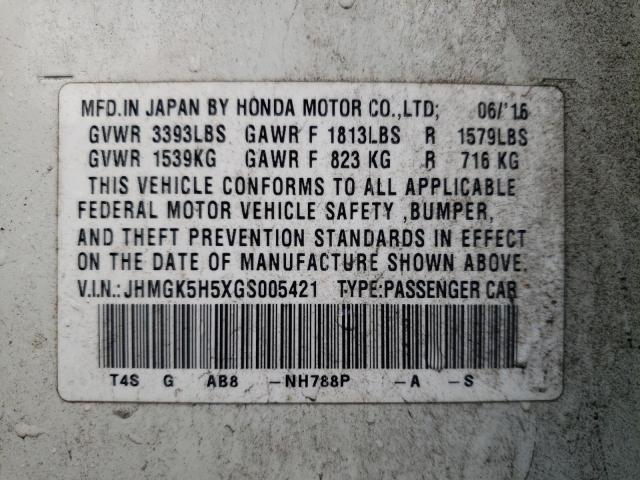 JHMGK5H5XGS005421 - 2016 HONDA FIT LX WHITE photo 13