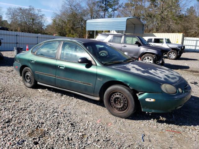 1FAFP5224XG203756 - 1999 FORD TAURUS LX GREEN photo 4