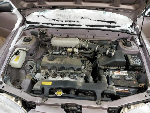 KMHVD14N7VU239031 - 1997 HYUNDAI ACCENT L SILVER photo 11