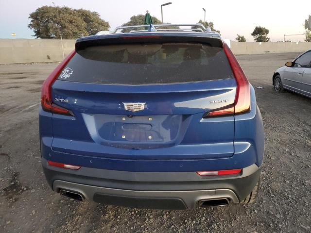 1GYFZCR40MF005669 - 2021 CADILLAC XT4 PREMIUM LUXURY BLUE photo 6