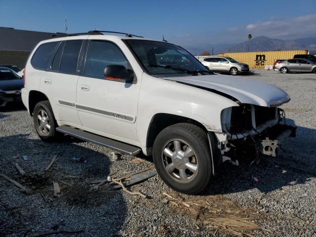 1GKDT13S542232765 - 2004 GMC ENVOY WHITE photo 4