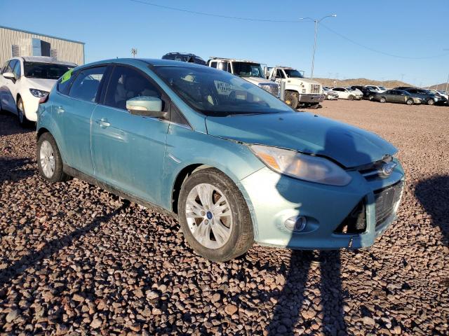 1FAHP3M21CL123309 - 2012 FORD FOCUS SEL BLUE photo 4