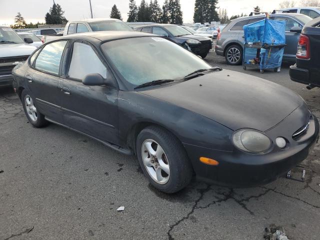 1FAFP53U4XG279879 - 1999 FORD TAURUS SE BLACK photo 4