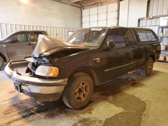 1FTZX1768WKC13021 - 1998 FORD F150 BLACK photo 1