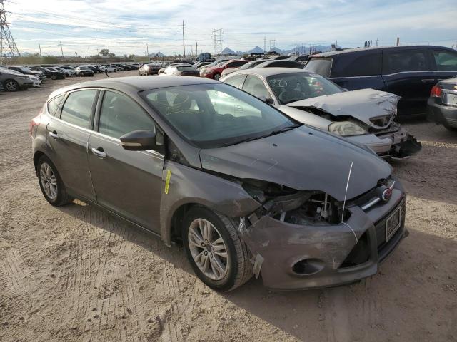 1FAHP3M22CL344322 - 2012 FORD FOCUS SEL SILVER photo 4