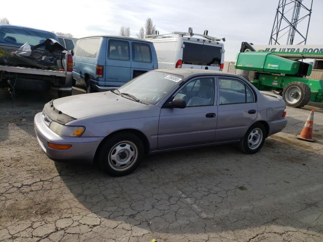 1NXBA02E4VZ587345 - 1997 TOYOTA COROLLA BASE GRAY photo 1