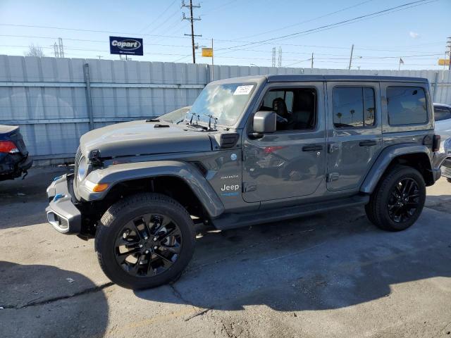 1C4JJXP65NW199085 - 2022 JEEP WRANGLER U SAHARA 4XE GRAY photo 1