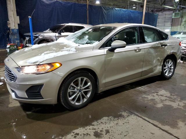 3FA6P0HD0KR210099 - 2019 FORD FUSION SE GOLD photo 1