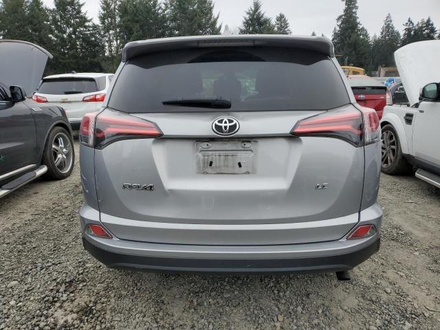 2T3ZFREV9JW406175 - 2018 TOYOTA RAV4 LE SILVER photo 6