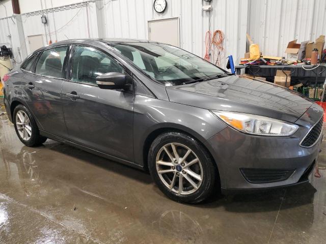 1FADP3F23HL305872 - 2017 FORD FOCUS SE GRAY photo 4