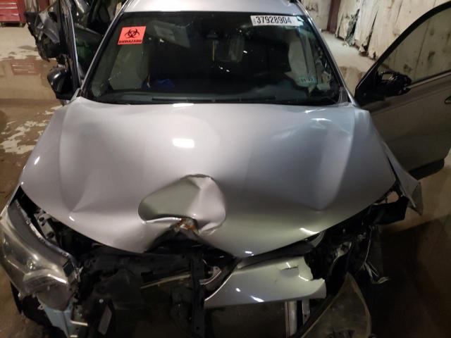 JTMZFREV4JJ163633 - 2018 TOYOTA RAV 4 LE SILVER photo 11