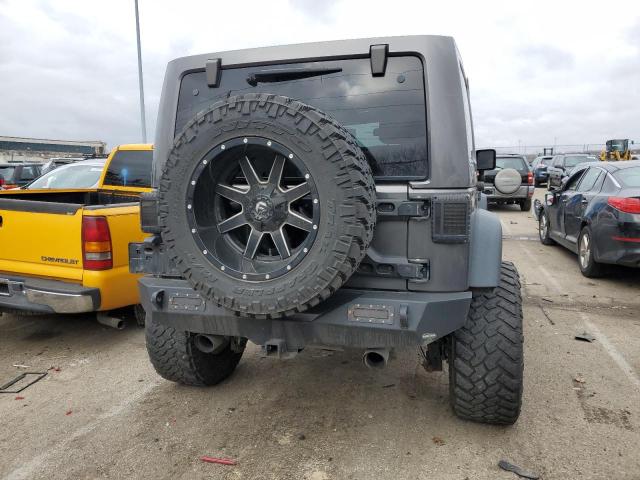 1C4BJWDG4GL309446 - 2016 JEEP WRANGLER U SPORT GRAY photo 6