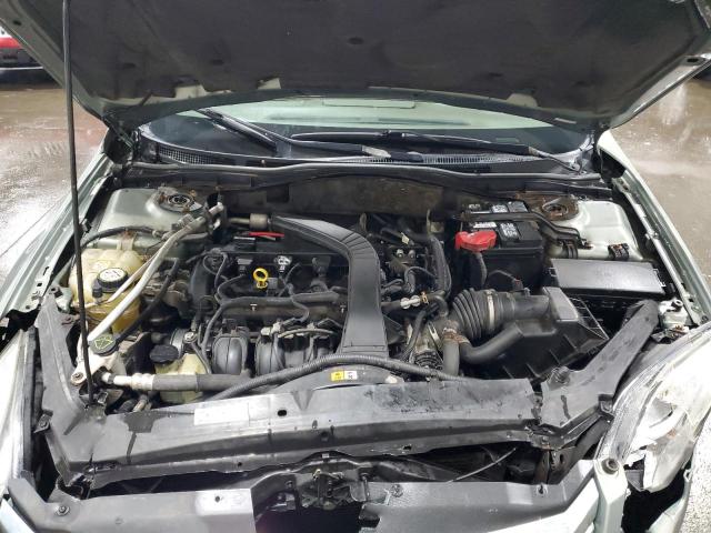 3FAHP07Z48R188588 - 2008 FORD FUSION SE GREEN photo 11