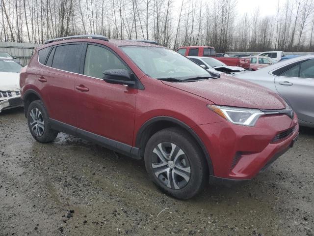 JTMBFREV9JD255174 - 2018 TOYOTA RAV4 LE RED photo 4