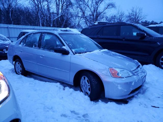 1HGES16502L005906 - 2002 HONDA CIVIC LX SILVER photo 4