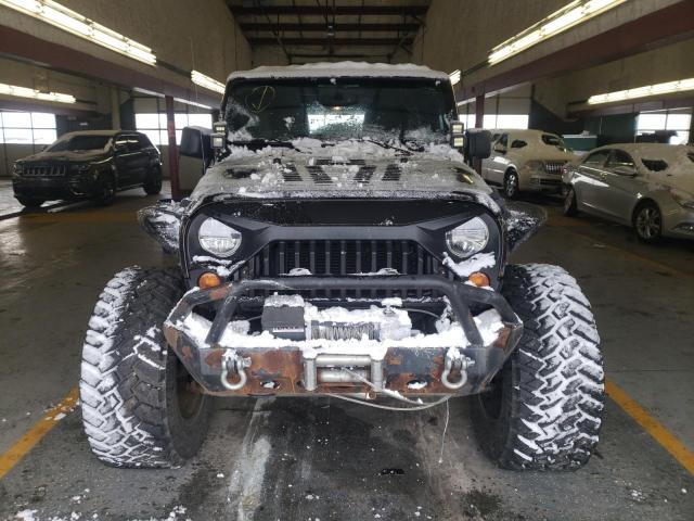 1C4BJWDG5DL669076 - 2013 JEEP WRANGLER U SPORT შავი ფოტო 5