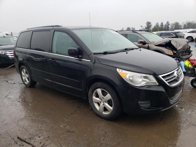 2V4RW3DG8BR642589 - 2011 VOLKSWAGEN ROUTAN SE BLACK photo 4