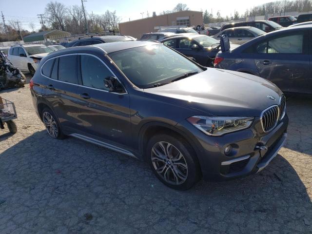 WBXHT3Z31H4A57858 - 2017 BMW X1 XDRIVE2 GRAY photo 4