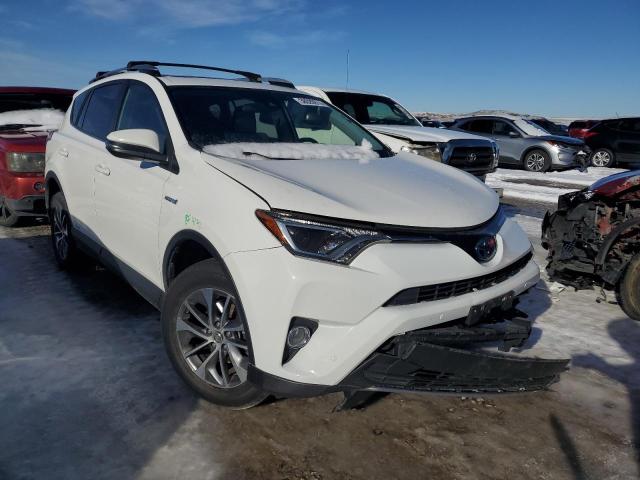 JTMRJREV2JD230632 - 2018 TOYOTA RAV4 HV LE WHITE photo 4