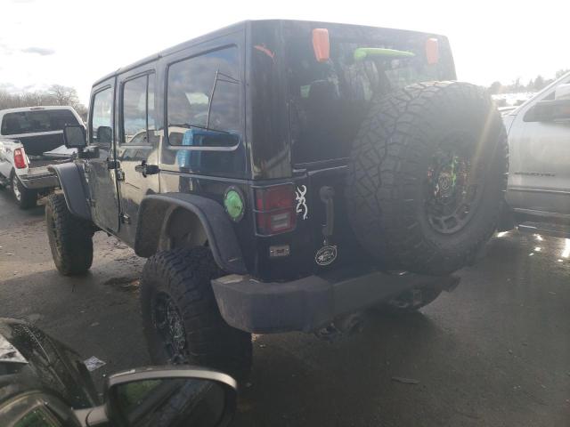 1J4HA3H12BL625669 - 2011 JEEP WRANGLER U SPORT შავი ფოტო 2