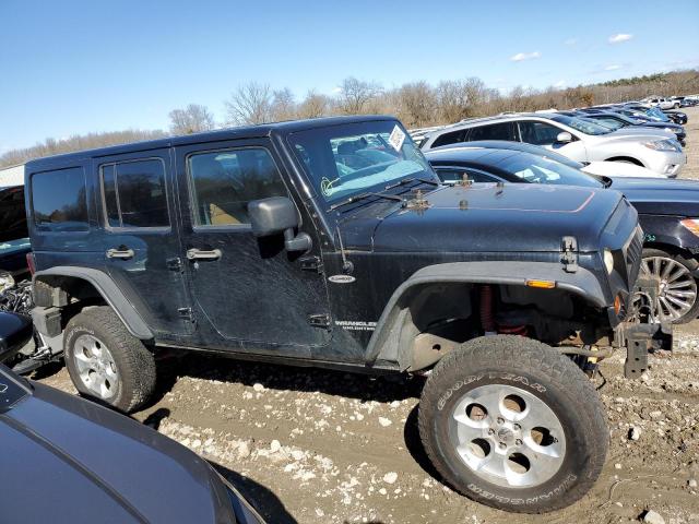 1J4HA3H12BL625669 - 2011 JEEP WRANGLER U SPORT შავი ფოტო 4
