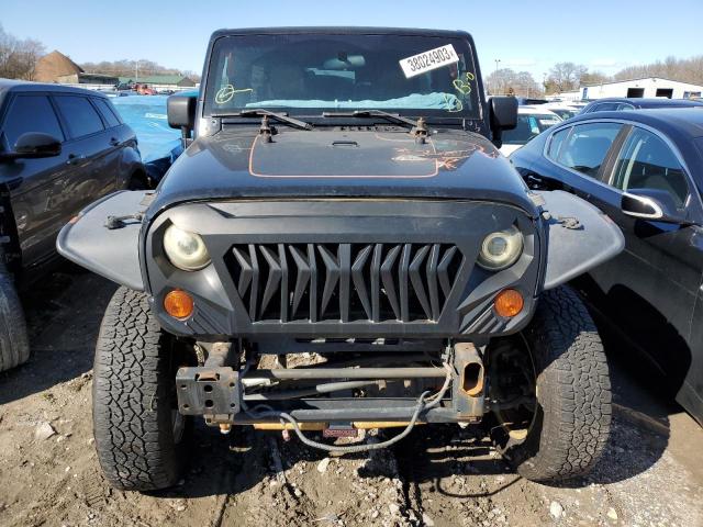 1J4HA3H12BL625669 - 2011 JEEP WRANGLER U SPORT შავი ფოტო 5