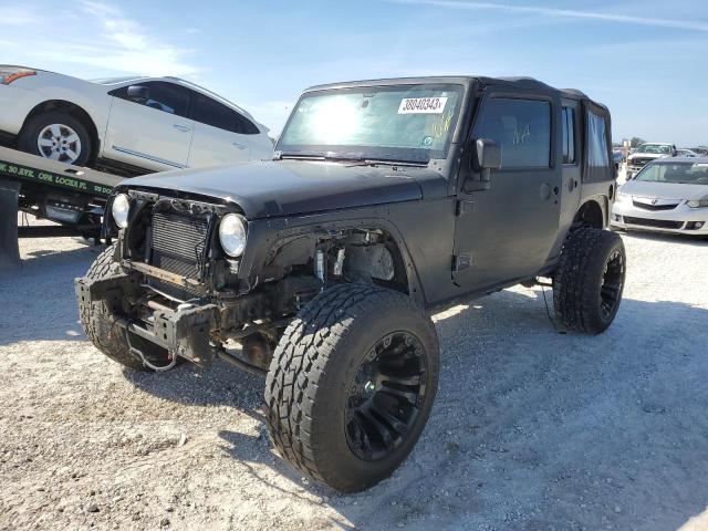 1C4BJWEG5DL568294 - 2013 JEEP WRANGLER U SAHARA BLACK photo 1
