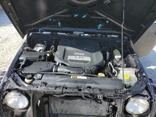 1C4BJWEG5DL568294 - 2013 JEEP WRANGLER U SAHARA BLACK photo 11