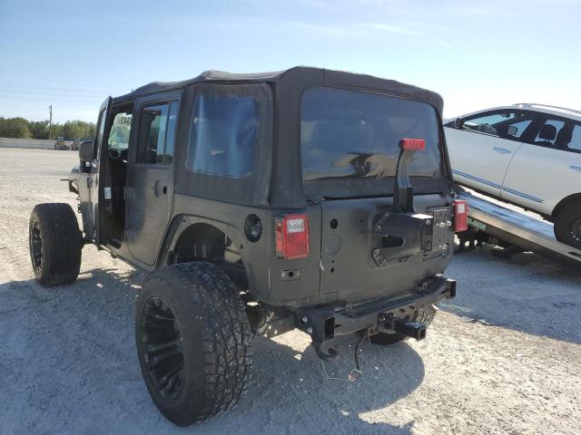 1C4BJWEG5DL568294 - 2013 JEEP WRANGLER U SAHARA BLACK photo 2