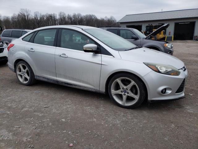 1FAHP3J21CL269911 - 2012 FORD FOCUS TITANIUM SILVER photo 4