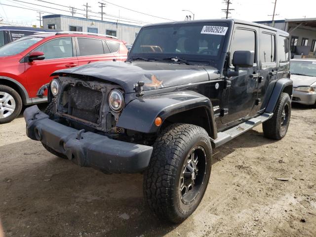 1C4BJWEG5DL657153 - 2013 JEEP WRANGLER U SAHARA BLACK photo 1