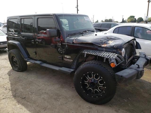 1C4BJWEG5DL657153 - 2013 JEEP WRANGLER U SAHARA BLACK photo 4