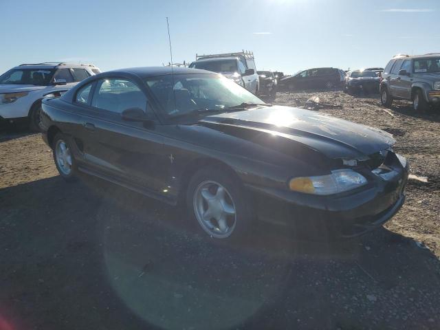 1FALP4043TF105710 - 1996 FORD MUSTANG BLACK photo 4