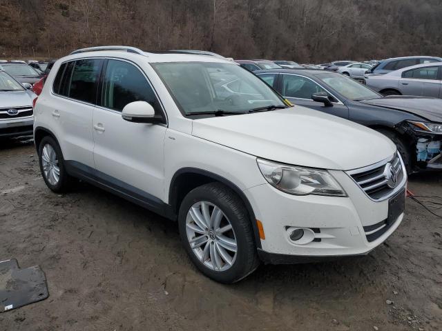 WVGBV7AXXAW530551 - 2010 VOLKSWAGEN TIGUAN SE WHITE photo 4