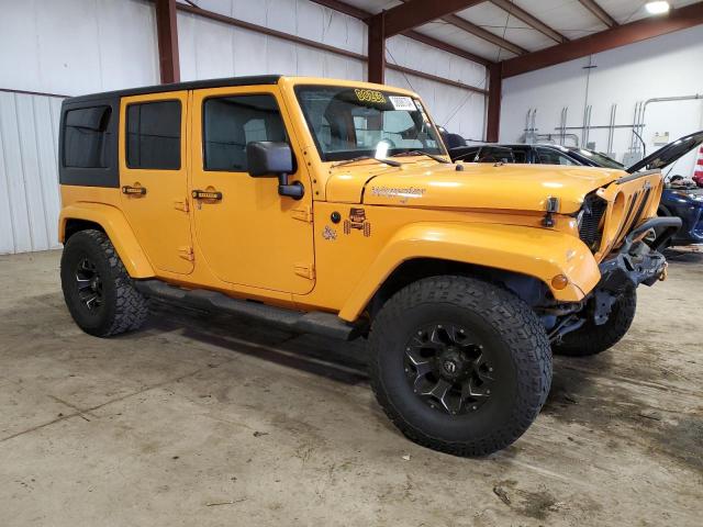 1C4HJWEG5CL130478 - 2012 JEEP WRANGLER U SAHARA ORANGE photo 4