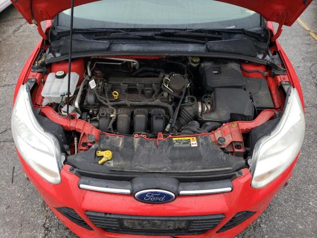 1FAHP3F29CL142056 - 2012 FORD FOCUS SE RED photo 11