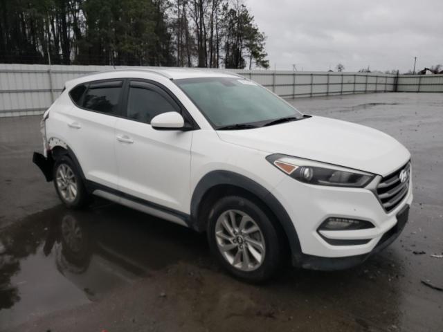 KM8J33A41HU430652 - 2017 HYUNDAI TUCSON LIMITED WHITE photo 4