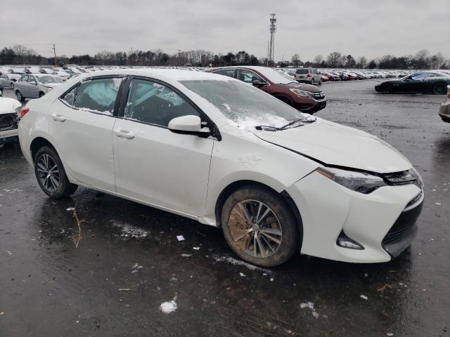 5YFBURHE5HP672638 - 2017 TOYOTA COROLLA L WHITE photo 4