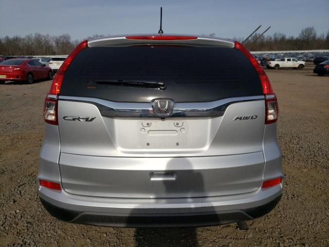 5J6RM4H34GL002693 - 2016 HONDA CR-V LX SILVER photo 6