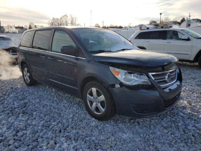 2V8HW34109R586289 - 2009 VOLKSWAGEN ROUTAN SE BLUE photo 4