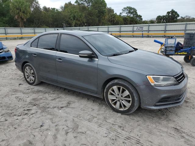 3VWD07AJ1FM412772 - 2015 VOLKSWAGEN JETTA SE GRAY photo 4