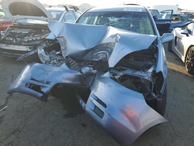 2T1KR32E94C274978 - 2004 TOYOTA COROLLA MA XR BLUE photo 5