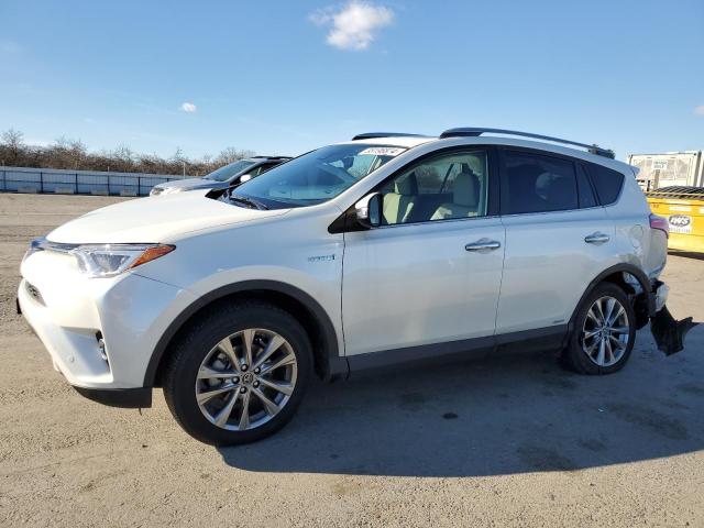 JTMDJREVXHD127415 - 2017 TOYOTA RAV4 HV LIMITED WHITE photo 1