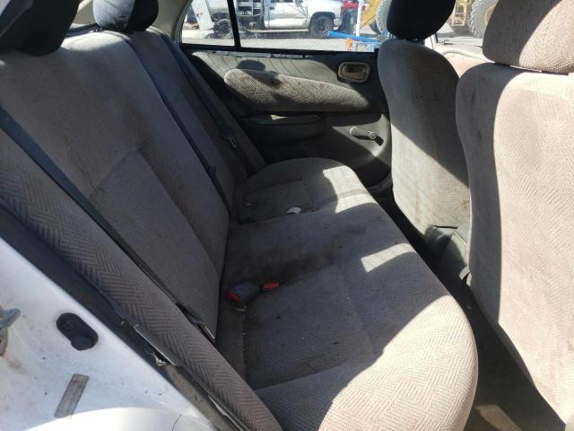 1Y1SK5287XZ421959 - 1999 CHEVROLET GEO PRIZM BASE WHITE photo 10