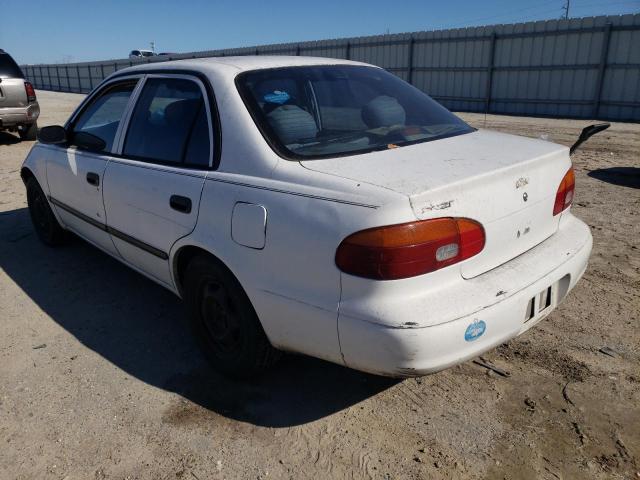 1Y1SK5287XZ421959 - 1999 CHEVROLET GEO PRIZM BASE WHITE photo 2