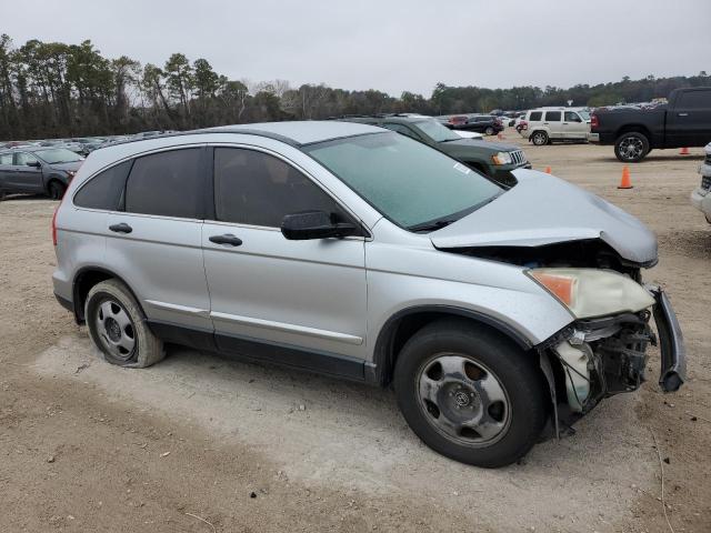 3CZRE3H35AG703643 - 2010 HONDA CR-V LX SILVER photo 4