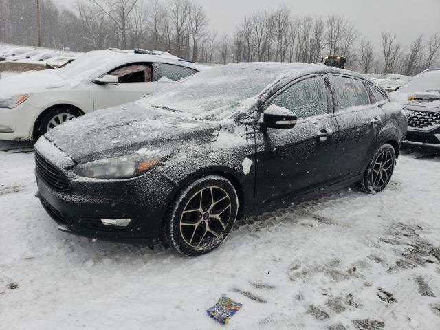 1FADP3F24JL329250 - 2018 FORD FOCUS SE BLACK photo 1