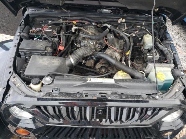 1J4GA59129L718689 - 2009 JEEP WRANGLER U SAHARA BLACK photo 12