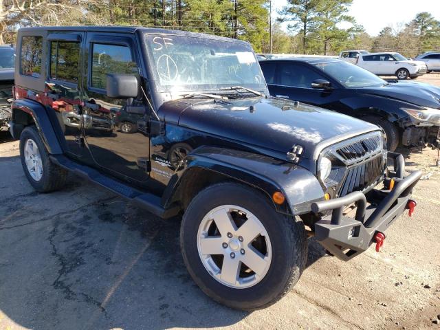 1J4GA59129L718689 - 2009 JEEP WRANGLER U SAHARA BLACK photo 4